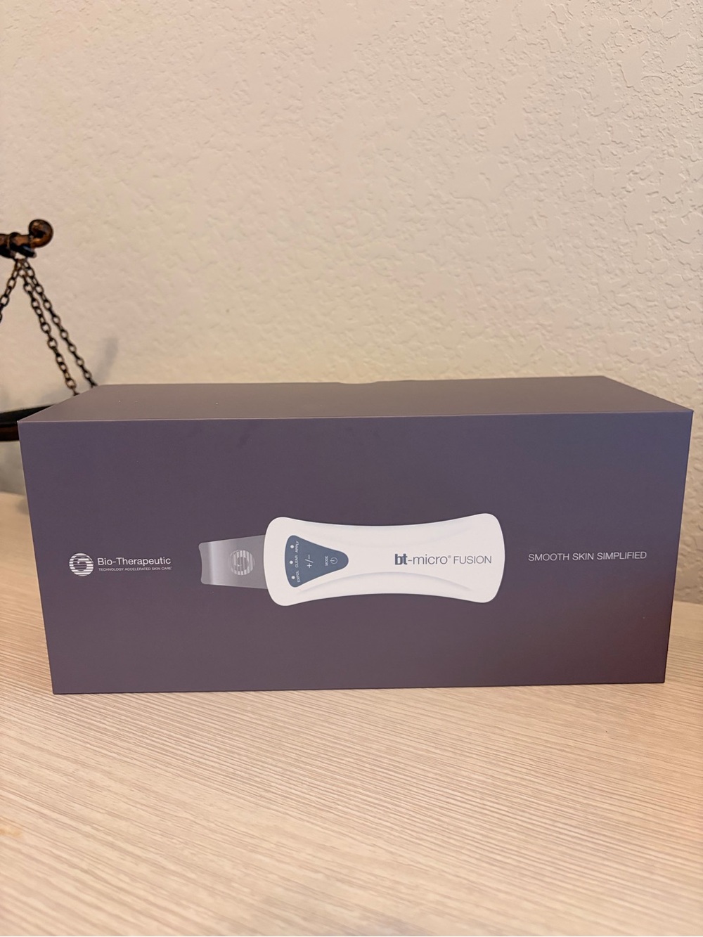 ELEMIS bt-micro Fusion Skincare Device in Dark Blue Box with White Device Image